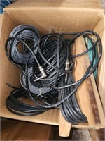 Lot of assorted cables including speaker cables.