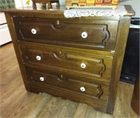 ANTIQUE THREE DRAWER DRESSER AND DOILIE