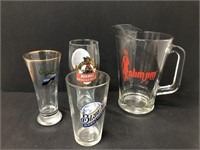 Pilsner glasses and beer pitcher