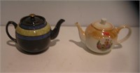 Pair of early tea pots by S. C. Richard