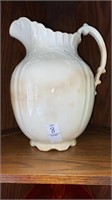 Washstand pitcher 12 inches tall. Handle cracked