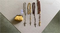 Four rosaries and change purse