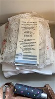 Stack of doily table coverings, kitchen