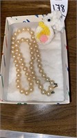 18 inch knotted pearl necklace and handmade bunny