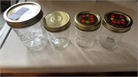 4 different sized mason jars with lids