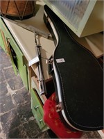 Guitar case and music stand