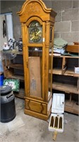 Howard Miller Grandfather clock with wind up key,