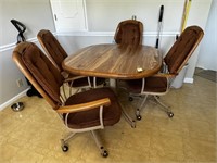Vintage Table & Rolling Chairs