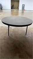 Six foot round plastic table
