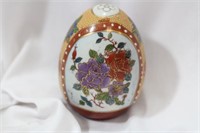 An Oriental Ceramic Egg