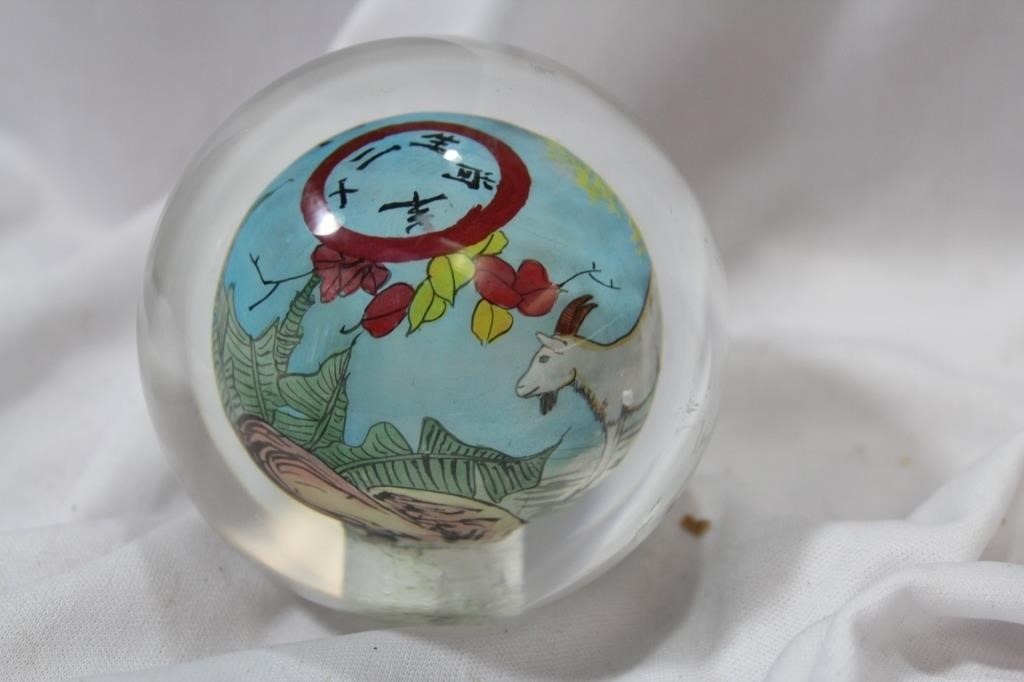 A Reverse Painting on Glass Paperweight