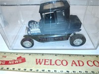 Vintage toy car, Ford model T in case.