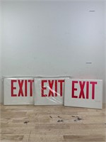 Three EXIT signs