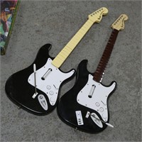 Pair of Game Console Plastic Guitars