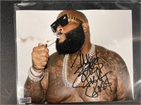 AUTOGRAPHED RICK ROSS PICTURE W/ COA