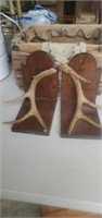 2 antler bookends with a wooden box