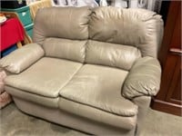 Leather loveseat w small stain