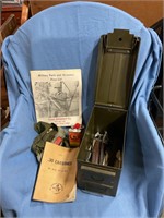 Ammo box w book and gun accessories