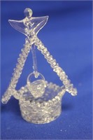 A Glass or Crystal Well with Bucket
