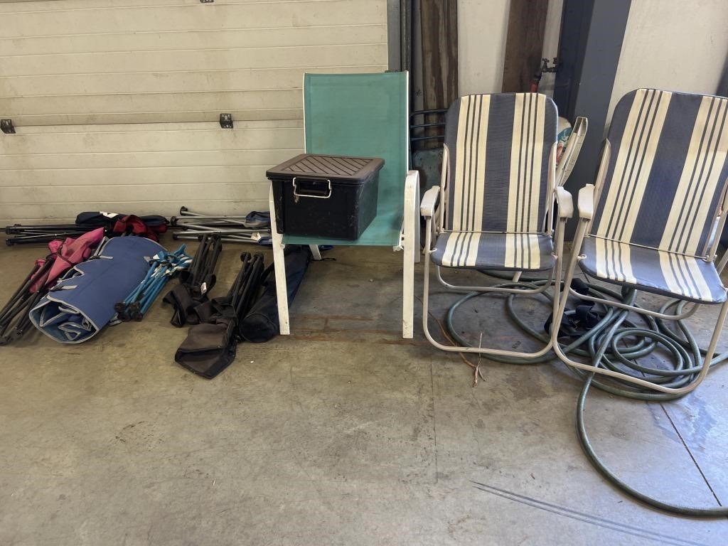 Large group of lawn chairs and bag chairs