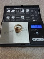 Gold 10k class ring weighs 9.1 grams 
1957 Tulsa