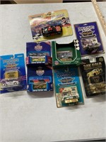 Assortment of NASCAR collectible cars, brickyard