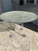 Glass top outdoor table with 1 chair