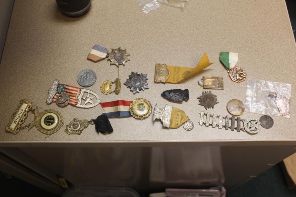 Lot of pendents, pins, etc.
