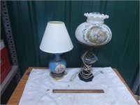 One small blue flowered lamp and one globe lamp