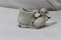 A Vintage Ceramic Shoe with Dog