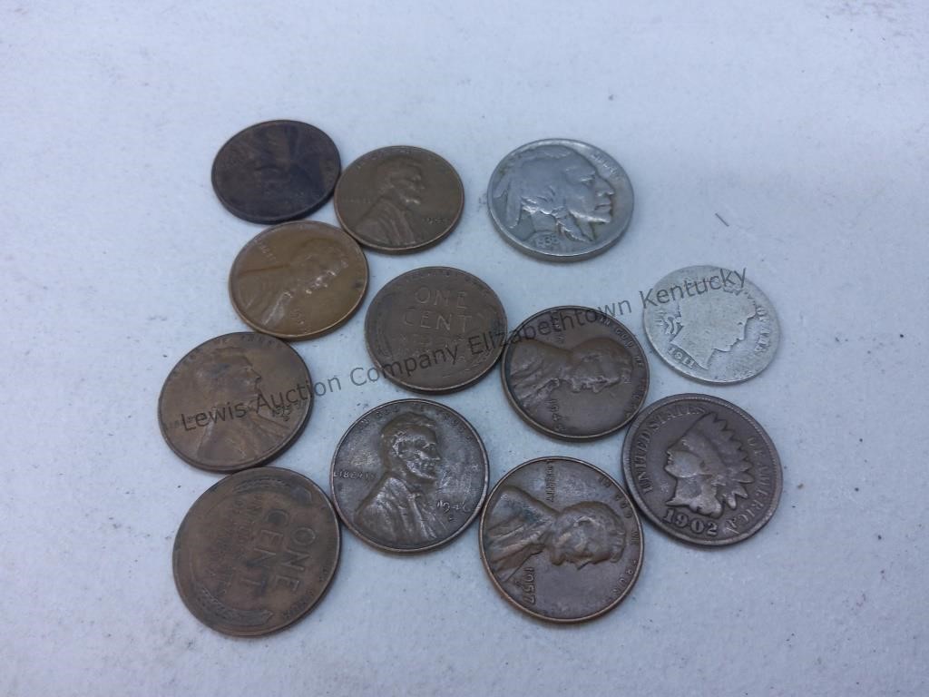 10 pennies, buffalo head nickel and a silver dime