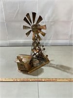 Copper colored metal windmill scene music box