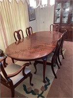 Wooden dining room set with 8 chairs, picture
