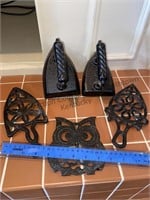 Cast iron number six, number five irons, trivets