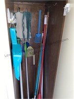 Assortment of brooms and more