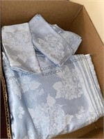 Box of tablecloths placemats and more