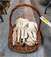 Basket of Porcelain and Cloth Doll Parts