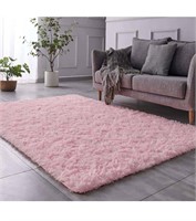 $94 (6.2'x9') Fluffy Pink Area Rug