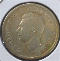 Silver 1938 Canadian quarter