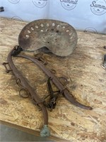 Vintage tractor seat and horse hames