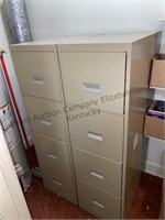 2 four drawer metal filing cabinets