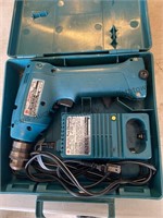 Makita drill, battery, charger, hard case