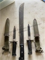2 bayonets, both appear to be repaired, and a