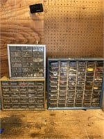 3 small storage trays, nuts, bolts screws, and