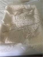Clear tote of doilies