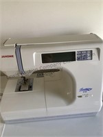 Portable sewing machine by Harmony 8100 with