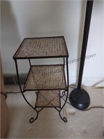 Small black iron table with floor lamp