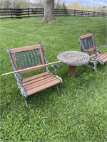 Two wooden metal outdoor chairs. Please note the