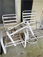 2 white porch chairs, no cushions, and more
