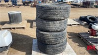 2 Tires on black Iron Rims 275/55 R 20